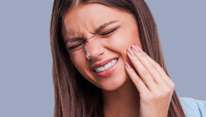 牙齦抽痛什麽原因？